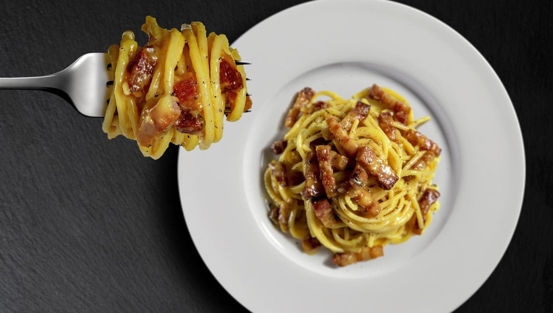 Carbonara Day, un mix tra uova, guanciale, pecorino e pepe nero: uno dei piatti più iconici della Capitale è il preferito dagli italiani